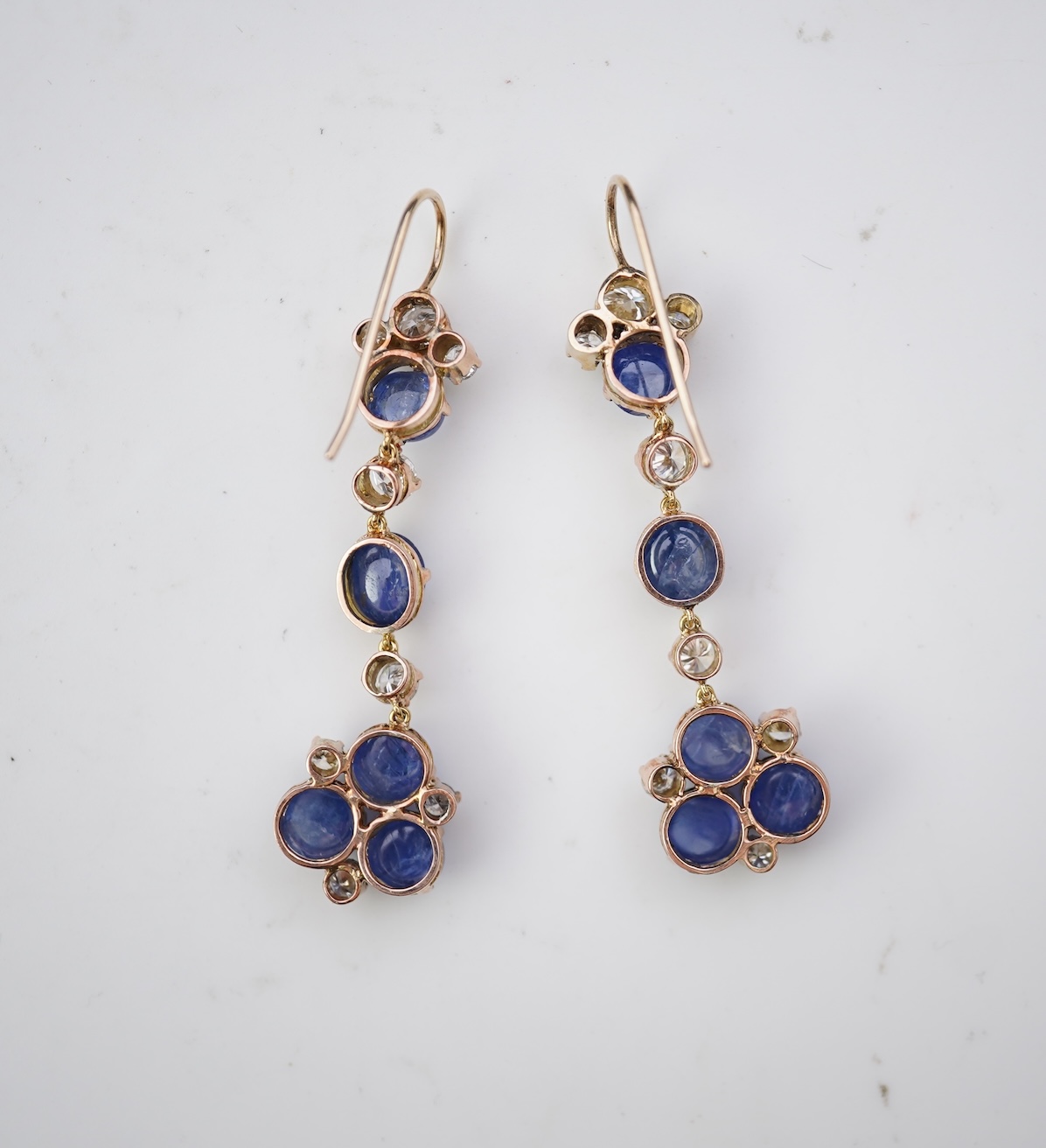 A pair of sapphire and diamond drop earrings